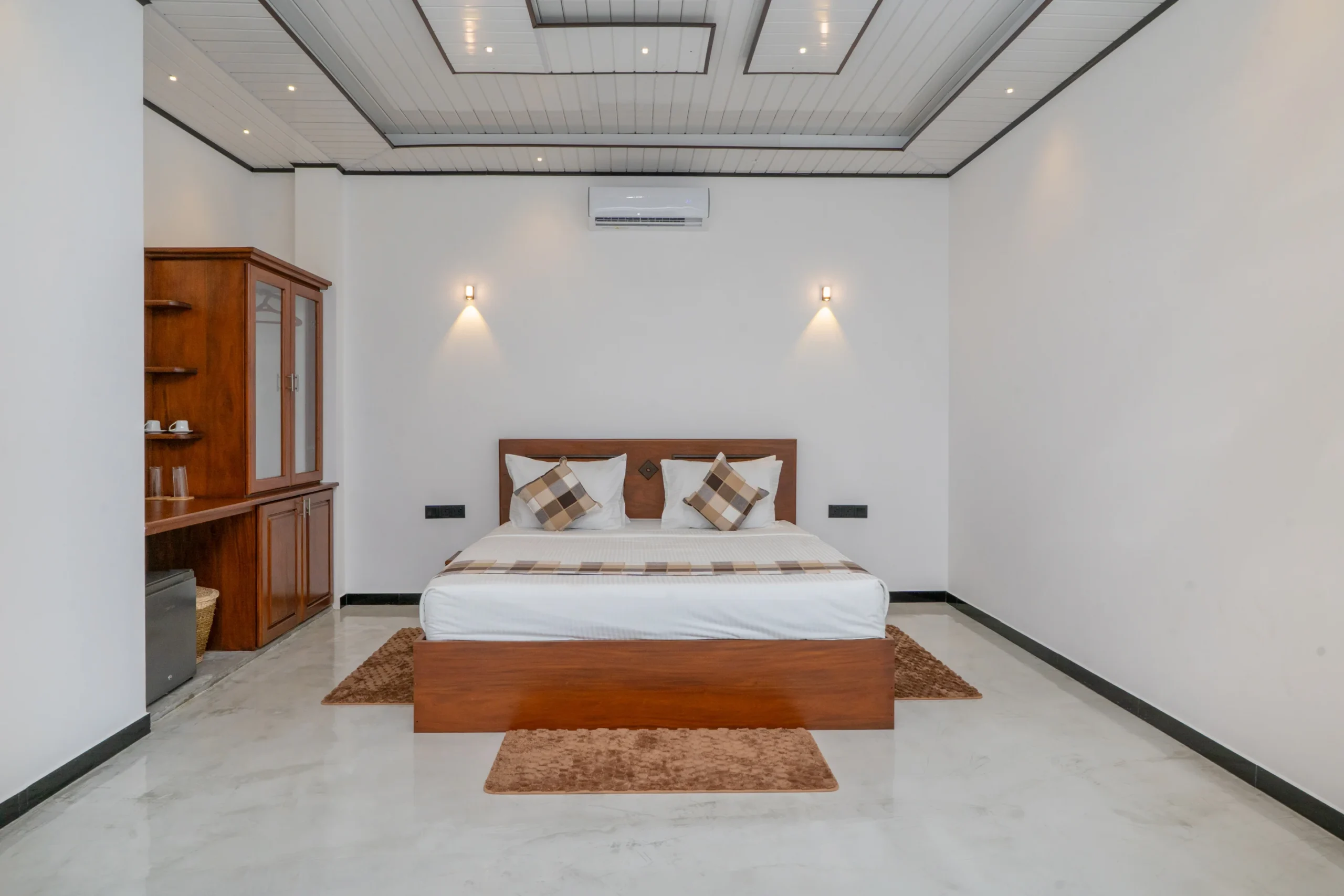 King Room at Arice Unawatuna with minimalist décor, wooden furniture, and warm lighting