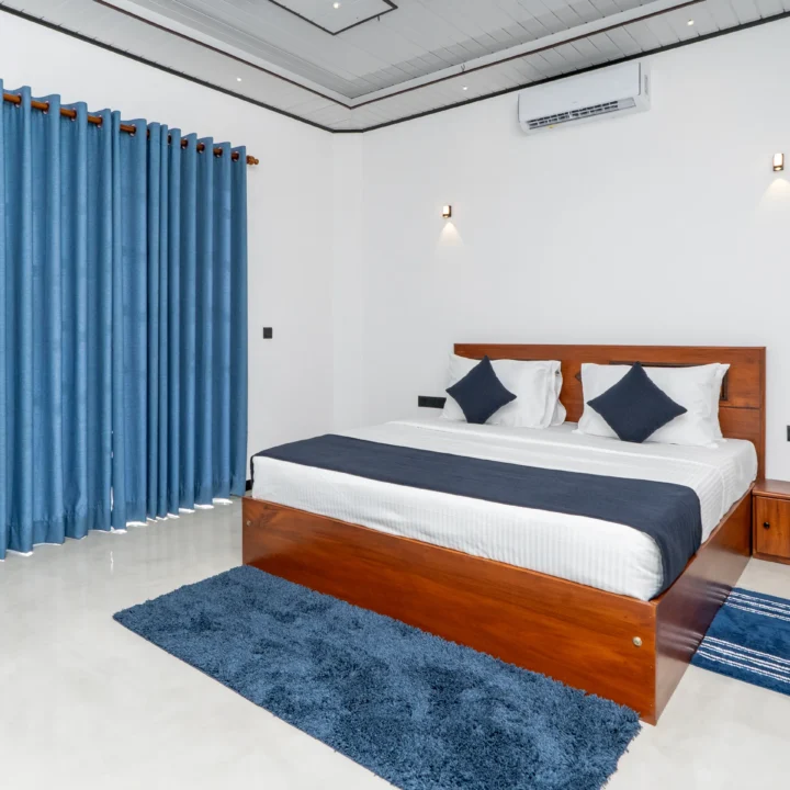 Evening pool view with villas and palm trees – Arice Eco Villa Sri Lanka